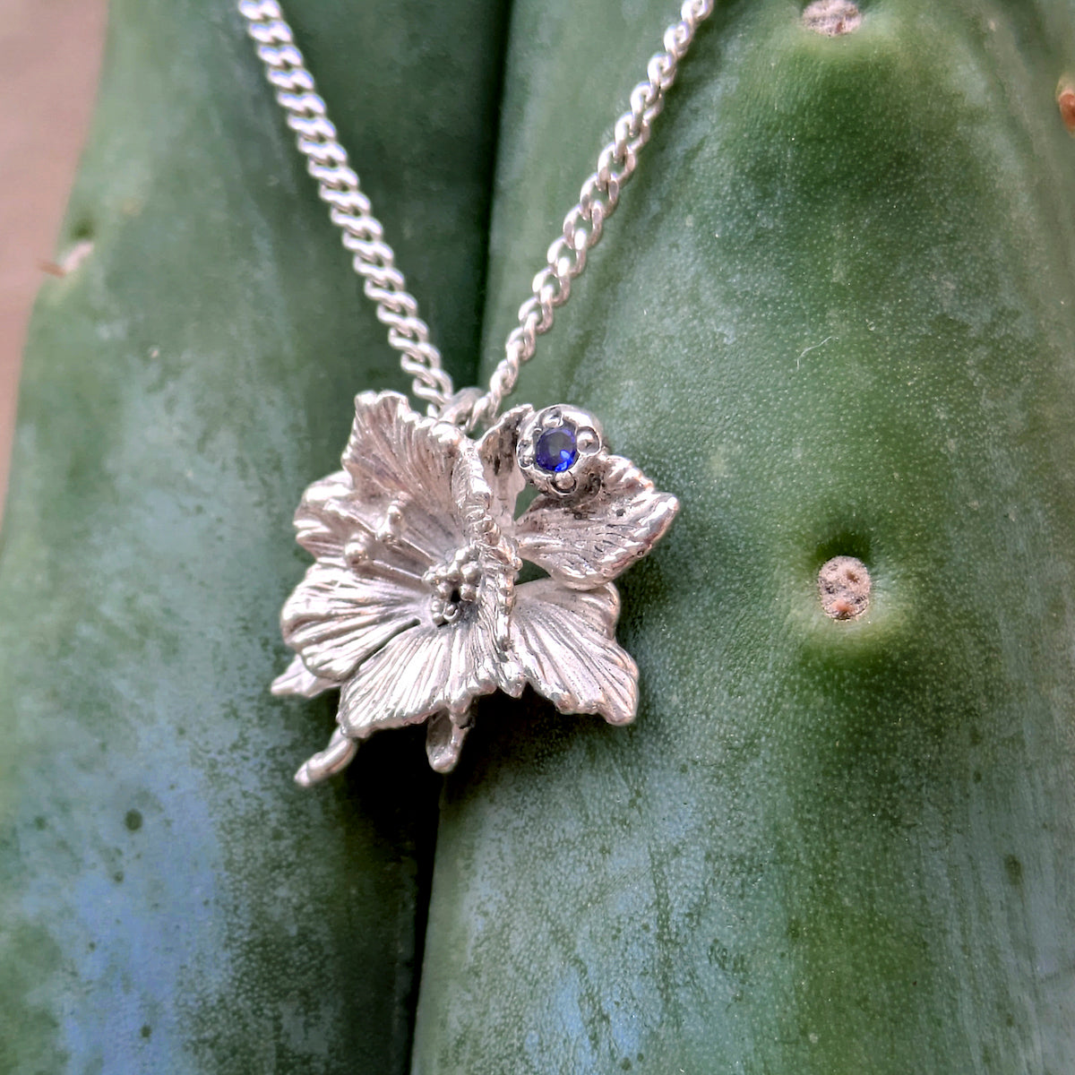 silver Hollyhock flower pendant