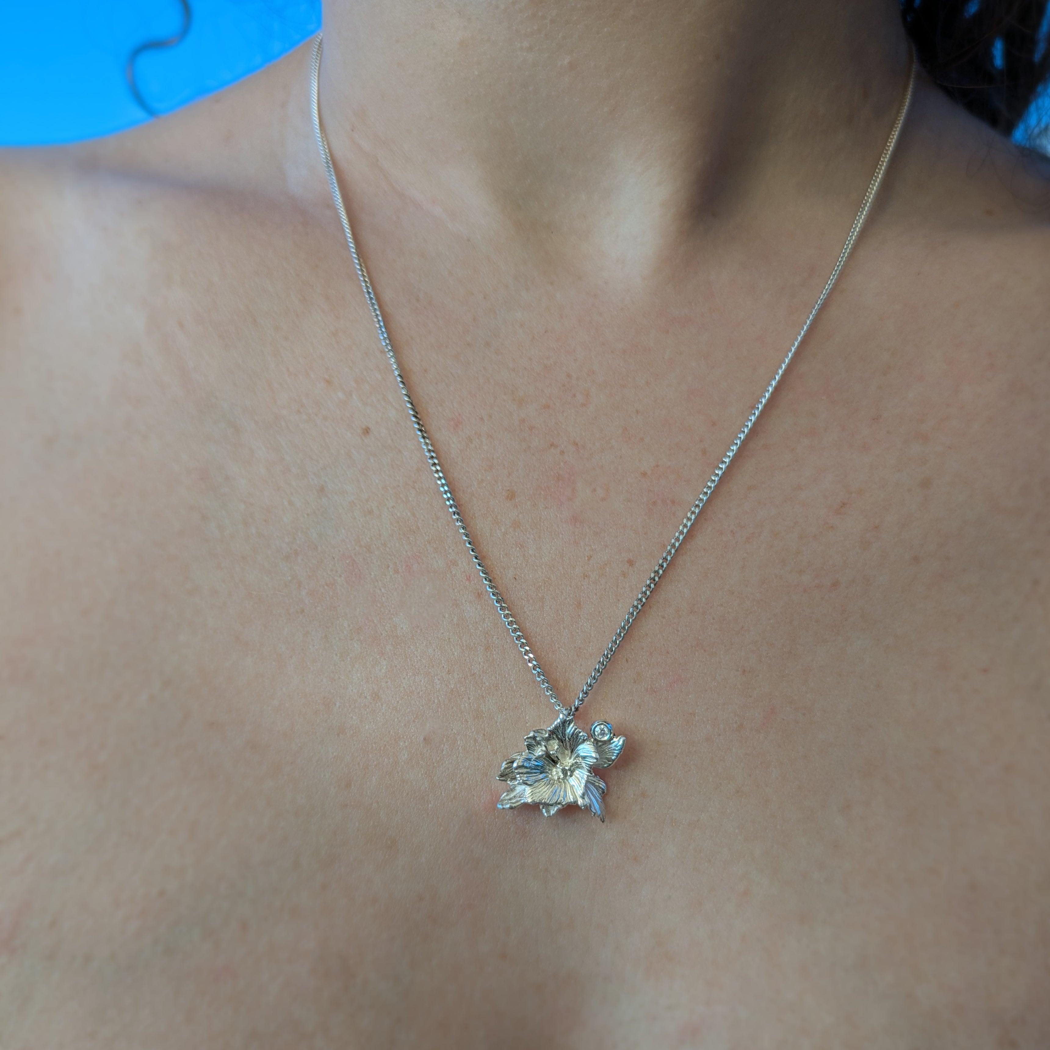 silver Hollyhock flower pendant