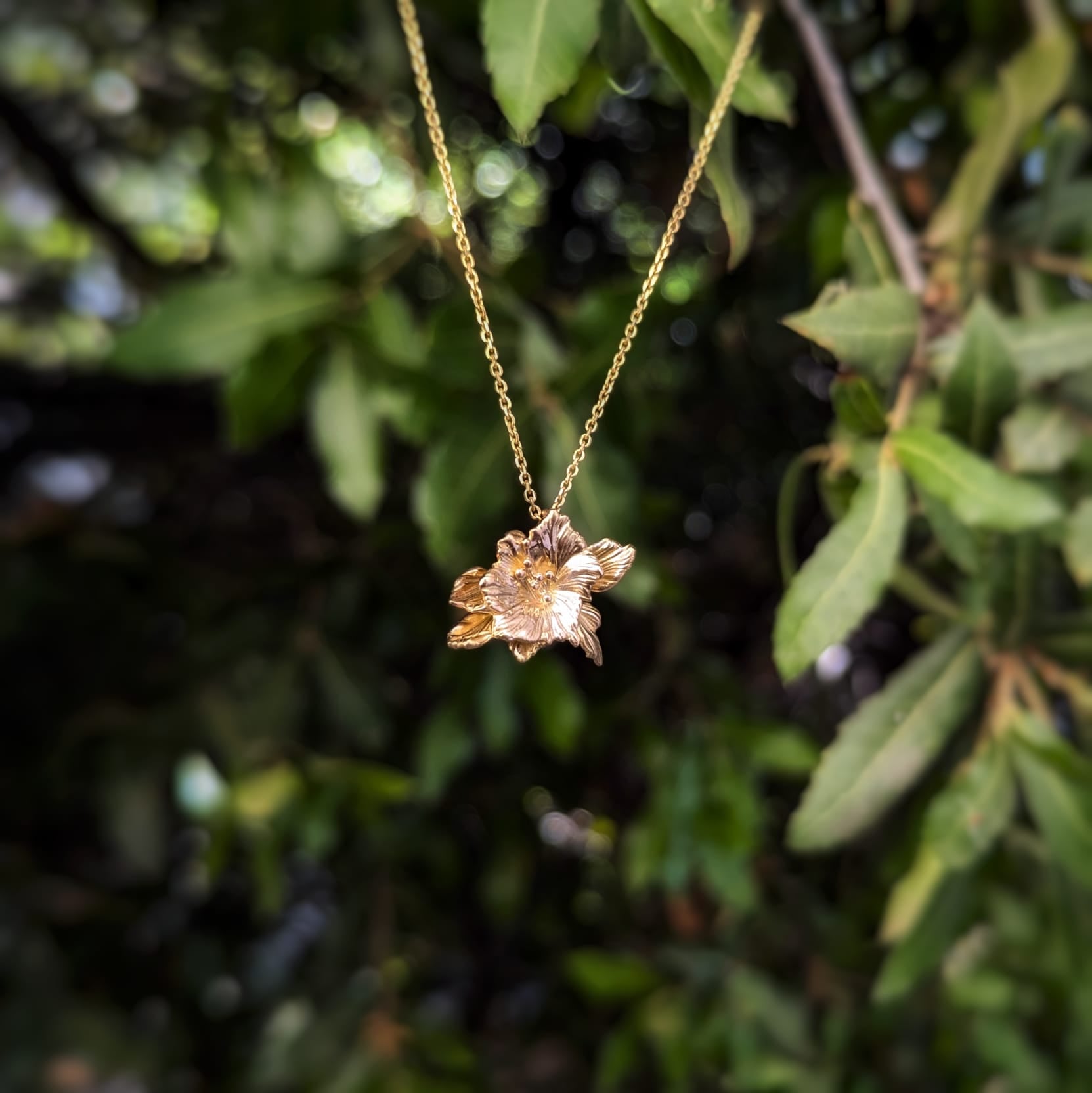 Hollyhock flower pendant